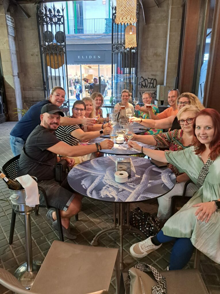 a group of people sitting around a table