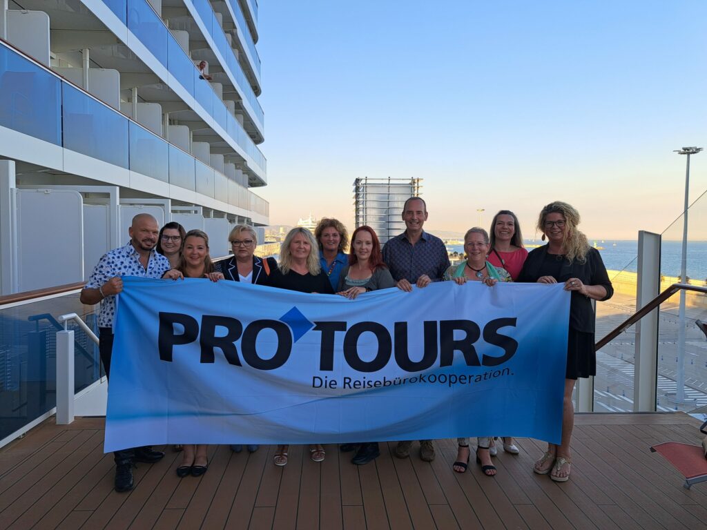 a group of people holding a banner