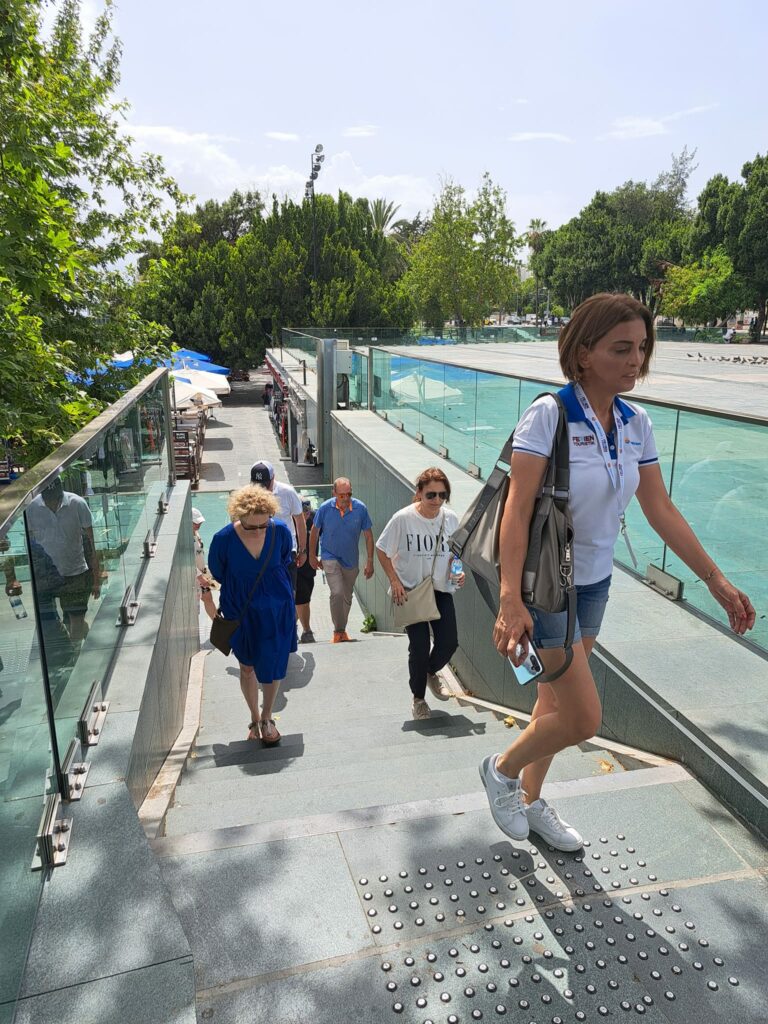 a woman walking down a staircase