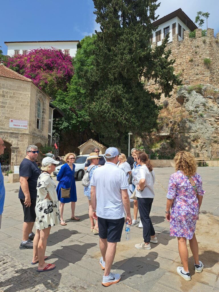 a group of people standing in a courtyard