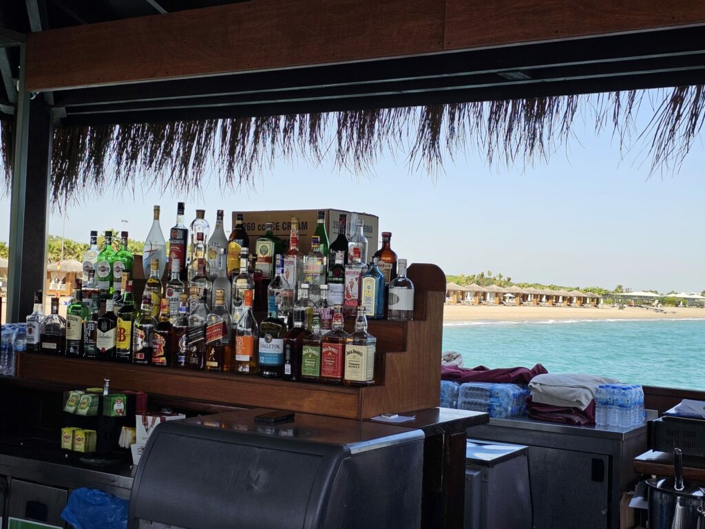 a bar with bottles of alcohol on it