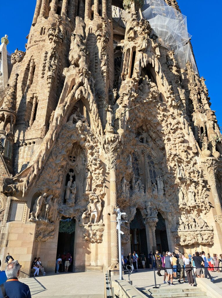 a large building with statues on the side