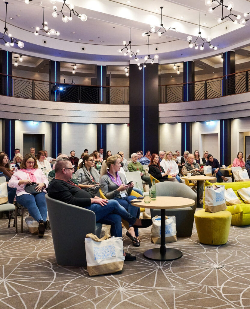 a group of people sitting in a room