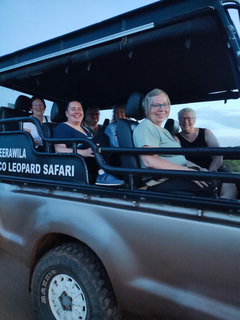 a group of people in a vehicle